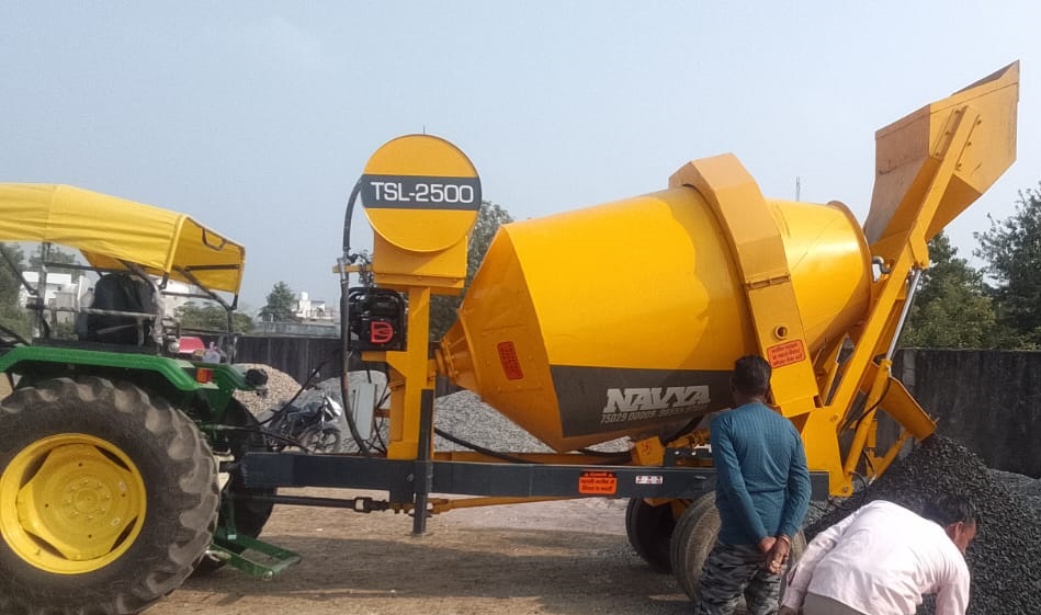 Working of Tractor Self Loading Concrete Mixer SLM